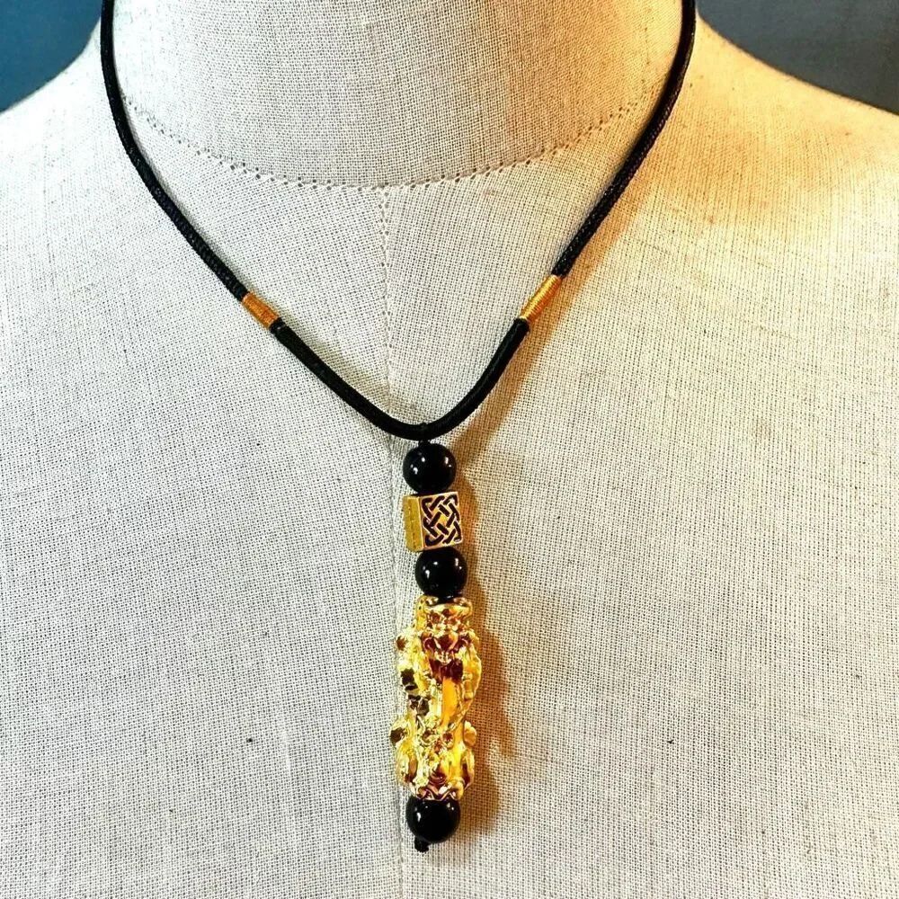 Lucky Dragon gold tone pendant necklace